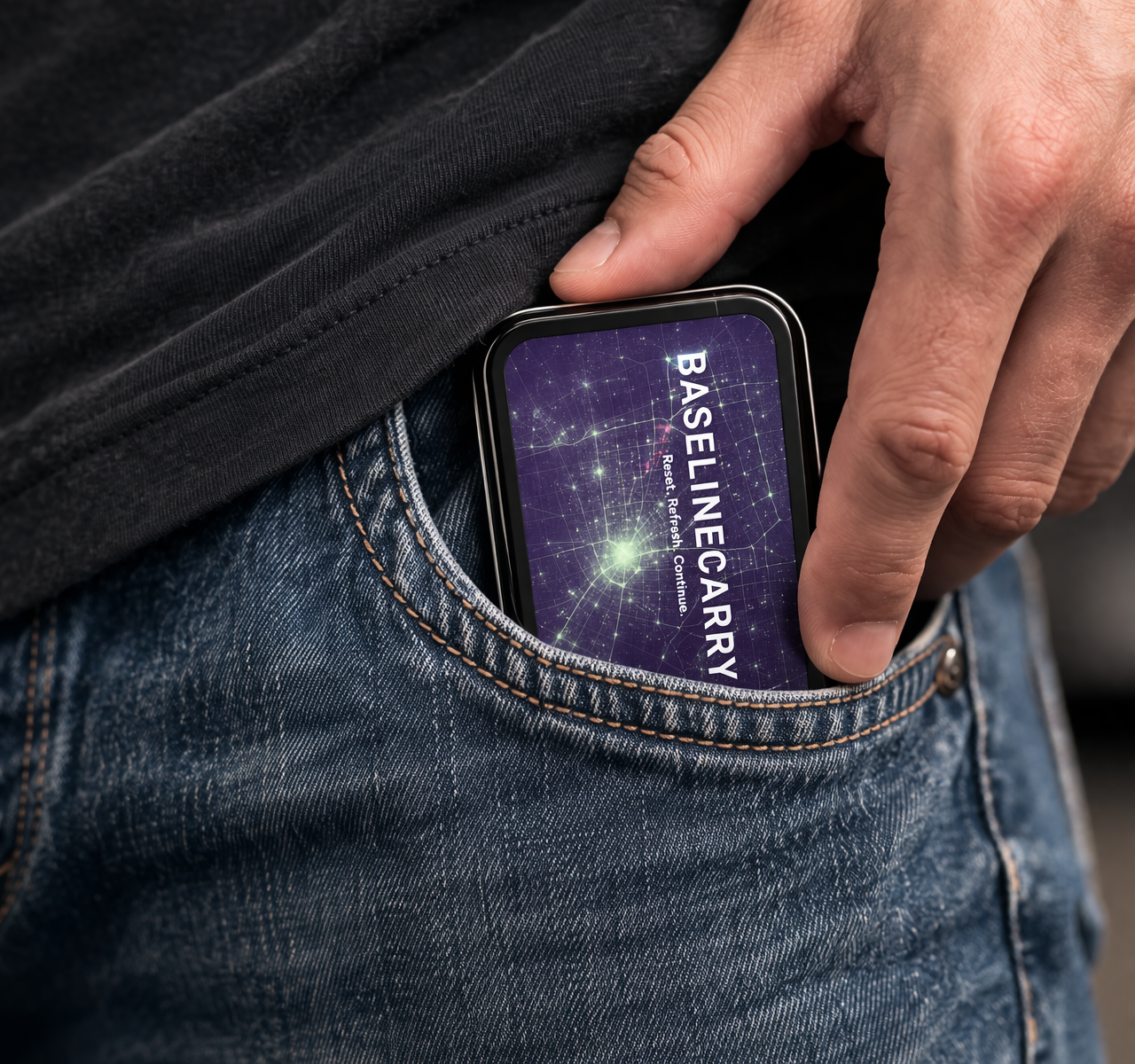 BaselineCarry Pocket Reset Tin sliding into a jeans pocket.